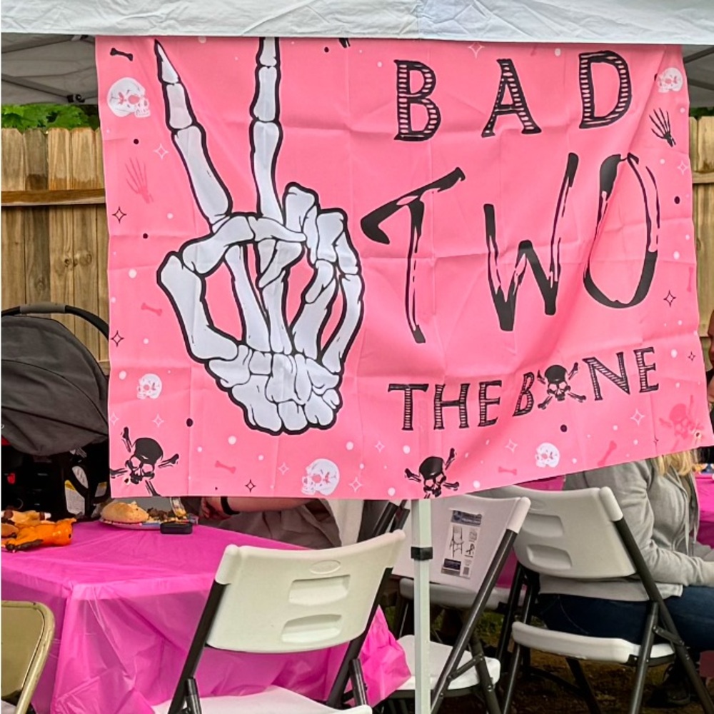 “Bad two the bone” banner